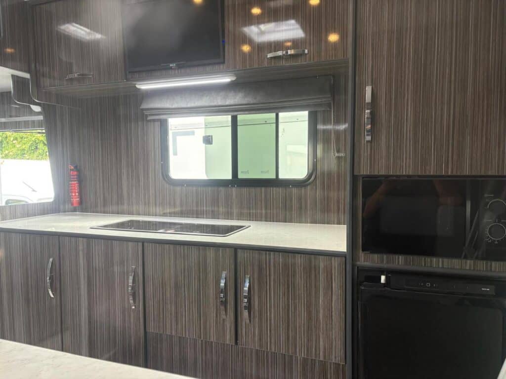 Interior of Millring Horsebox living accomodation showing kitchen area.